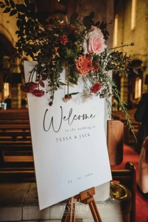 Sydney Wedding - a guest welcome sign sits at the front of a church