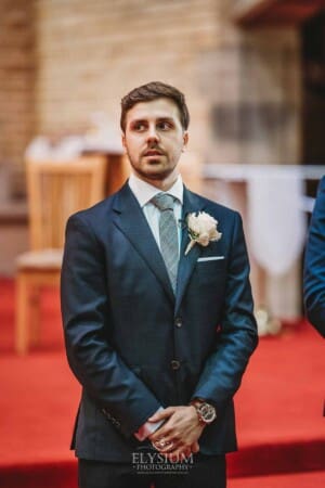 Sydney Wedding - a groom awaits the arrival of his bride at the ceremony