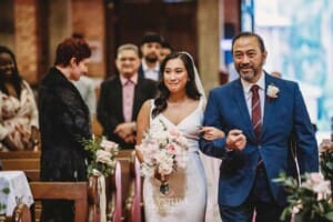 Sydney Wedding - a bride and her father walk down the ceremony aisle