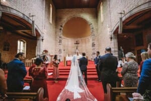 Sydney Wedding - a bride and groom stand together at their church ceremony