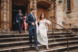 Sydney Wedding - a bride and groom exit the church after the ceremony