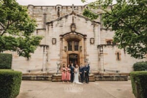 Sydney Wedding - bridal party stand outside the church after the ceremony