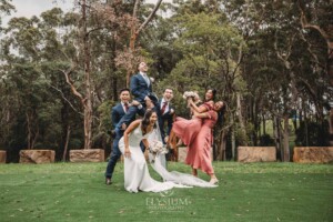 Sydney Wedding - bridal party having fun in the gardens at Springfield House