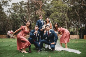 Sydney Wedding - bridal party having fun in the gardens at Springfield House