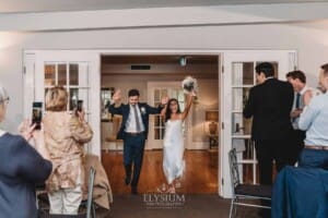 Sydney Wedding - bride and groom walk into their reception venue at Springfield House