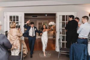 Sydney Wedding - bride and groom walk into their reception venue at Springfield House