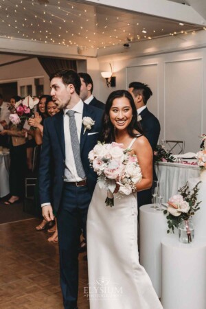 Sydney Wedding - bride and groom walk into their reception venue at Springfield House
