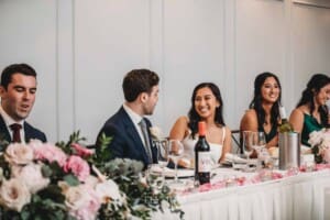 Sydney Wedding - newlyweds sit at the bridal table during their reception at Springfield House