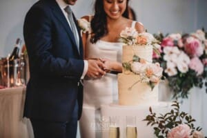 Sydney Wedding - the bride and groom cut their cake at the reception at Springfield House