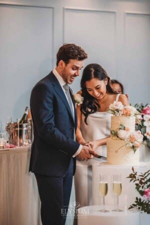 Sydney Wedding - the bride and groom cut their cake at the reception at Springfield House