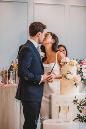 Sydney Wedding - the bride and groom cut their cake at the reception at Springfield House