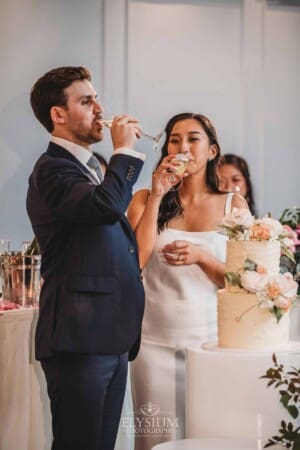 Sydney Wedding - the bride and groom cut their cake at the reception at Springfield House