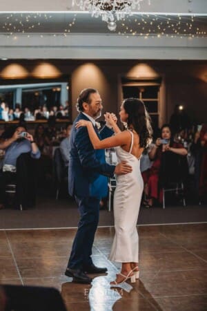 Sydney Wedding - the bride dances with her father during the reception at Springfield House