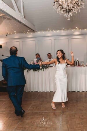 Sydney Wedding - the bride dances with her father during the reception at Springfield House