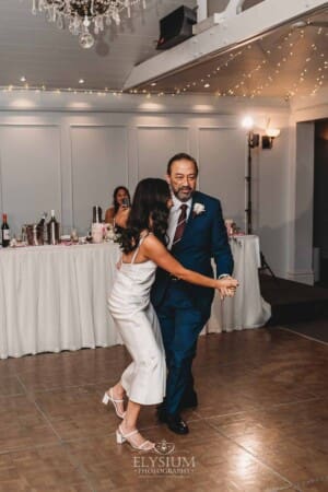 Sydney Wedding - the bride dances with her father during the reception at Springfield House