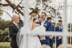 Bridal party stand at the front of their Camden wedding ceremony