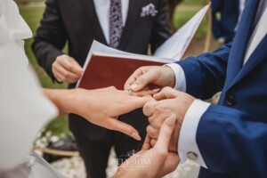 A couple exchange rings during their wedding ceremony at Camden