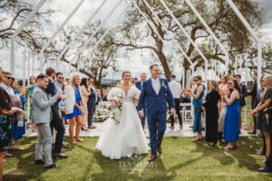 A couple walk the aisle after their Camden wedding ceremony