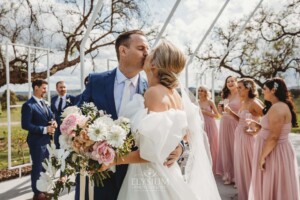 A bride and groom kiss after their Camden wedding ceremony