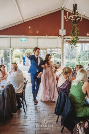 The bridal party dance as they enter the reception marque