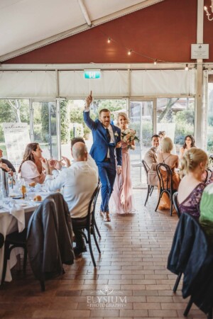 The bridal party dance as they enter the reception marque