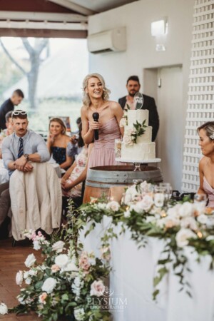 A bridesmaid makes her wedding speech during the reception at Burnham Grove