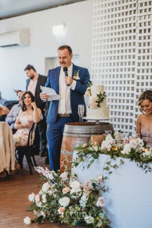 A groom makes his wedding speech during the reception