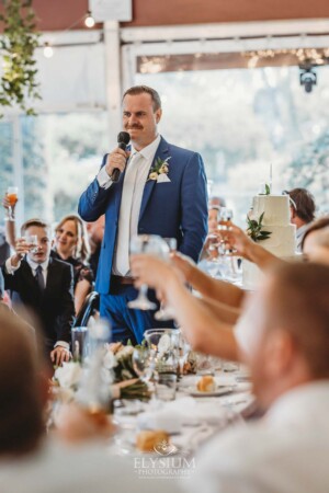 A groom makes his speech during their Burnham Grove wedding reception