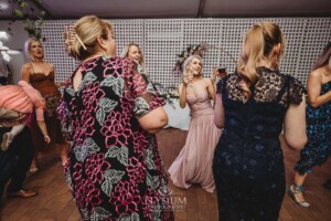 Wedding guests dance during the wedding reception at Burnham Grove in Camden