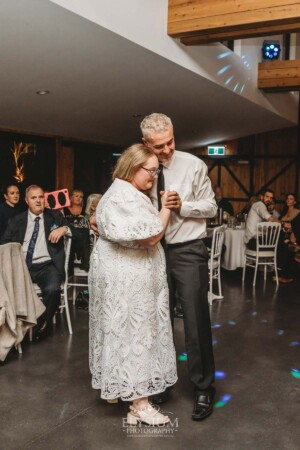 A bride shares her first dance with her father during the wedding reception at Ottimo House