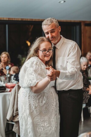 A bride shares her first dance with her father during the wedding reception at Ottimo House