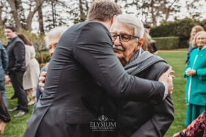 Wedding guests congratulate the happy couple after their ceremony at Bendooley