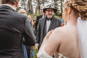 Wedding guests congratulate the happy couple after their ceremony at Bendooley