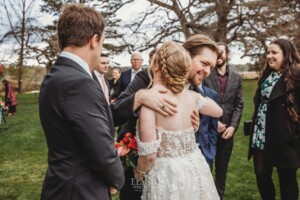 Wedding guests congratulate the happy couple after their ceremony at Bendooley