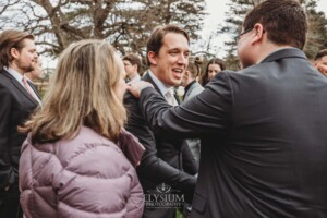 Wedding guests congratulate the happy couple after their ceremony at Bendooley