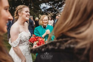 Wedding guests congratulate the happy couple after their ceremony at Bendooley