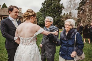 Wedding guests congratulate the happy couple after their ceremony at Bendooley