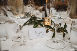 Wedding details showing table place cards sitting on the bridal table