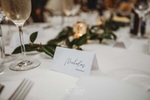 Wedding details showing table place cards sitting on the bridal table