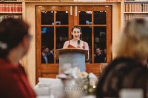 The maid of honor gives her wedding speech during the reception at Bendooley Book Barn