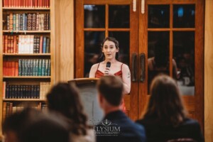 The maid of honor gives her wedding speech during the reception at Bendooley Book Barn