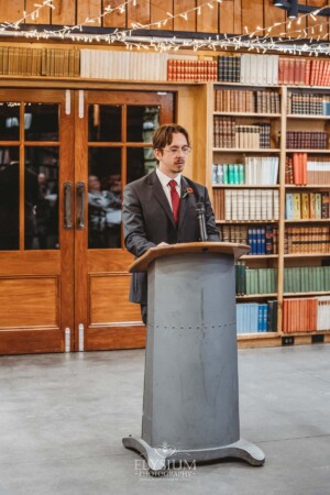 The best man delivers his wedding speech during the reception at Bendooley Book Barn