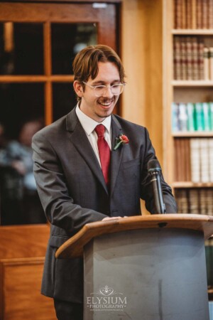 The best man delivers his wedding speech during the reception at Bendooley Book Barn