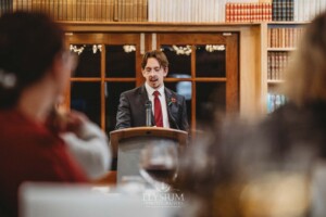 The best man delivers his wedding speech during the reception at Bendooley Book Barn
