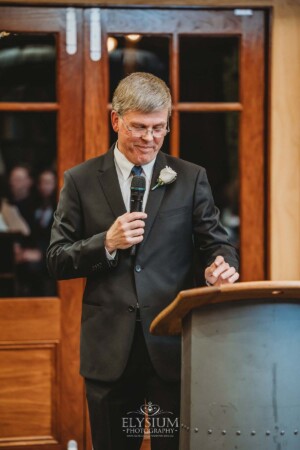 The father of the bride shares his wedding speech during the reception at Bendooley