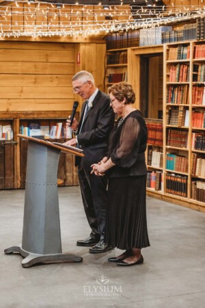 The groom's parents share their wedding speech during the reception at Bendooley