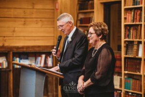 The groom's parents share their wedding speech during the reception at Bendooley