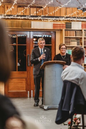 The groom's parents share their wedding speech during the reception at Bendooley