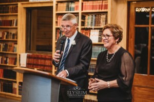 The groom's parents share their wedding speech during the reception at Bendooley