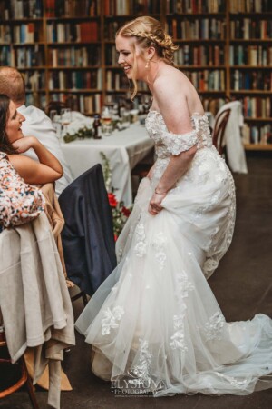 Candid photos of a bride and groom as they mingle with wedding guests during their evening reception